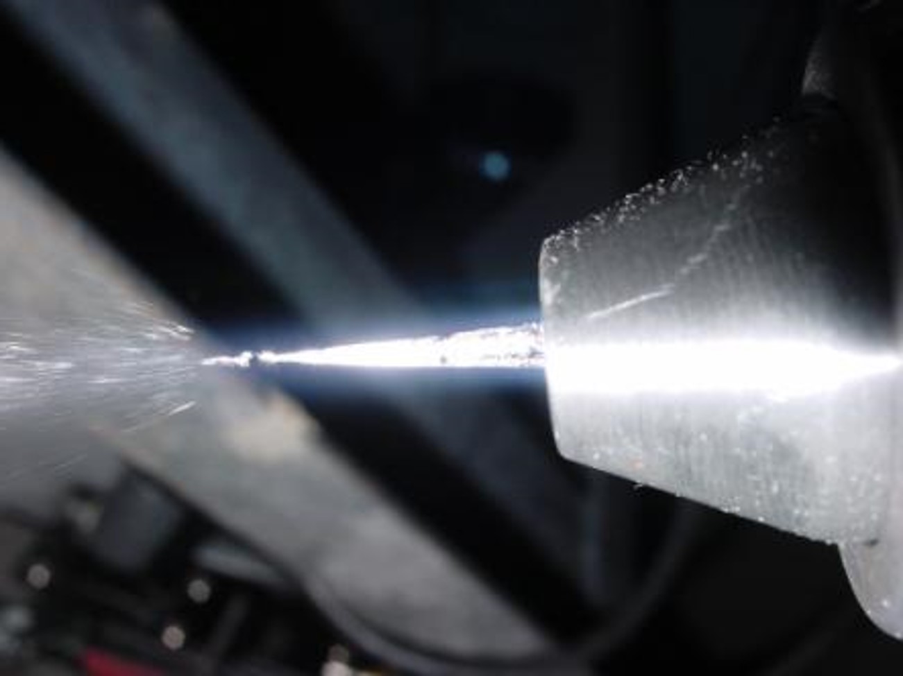 Flame spray consists of a spray material being continuously melted in the center of an acetylene-propane-oxygen flame.